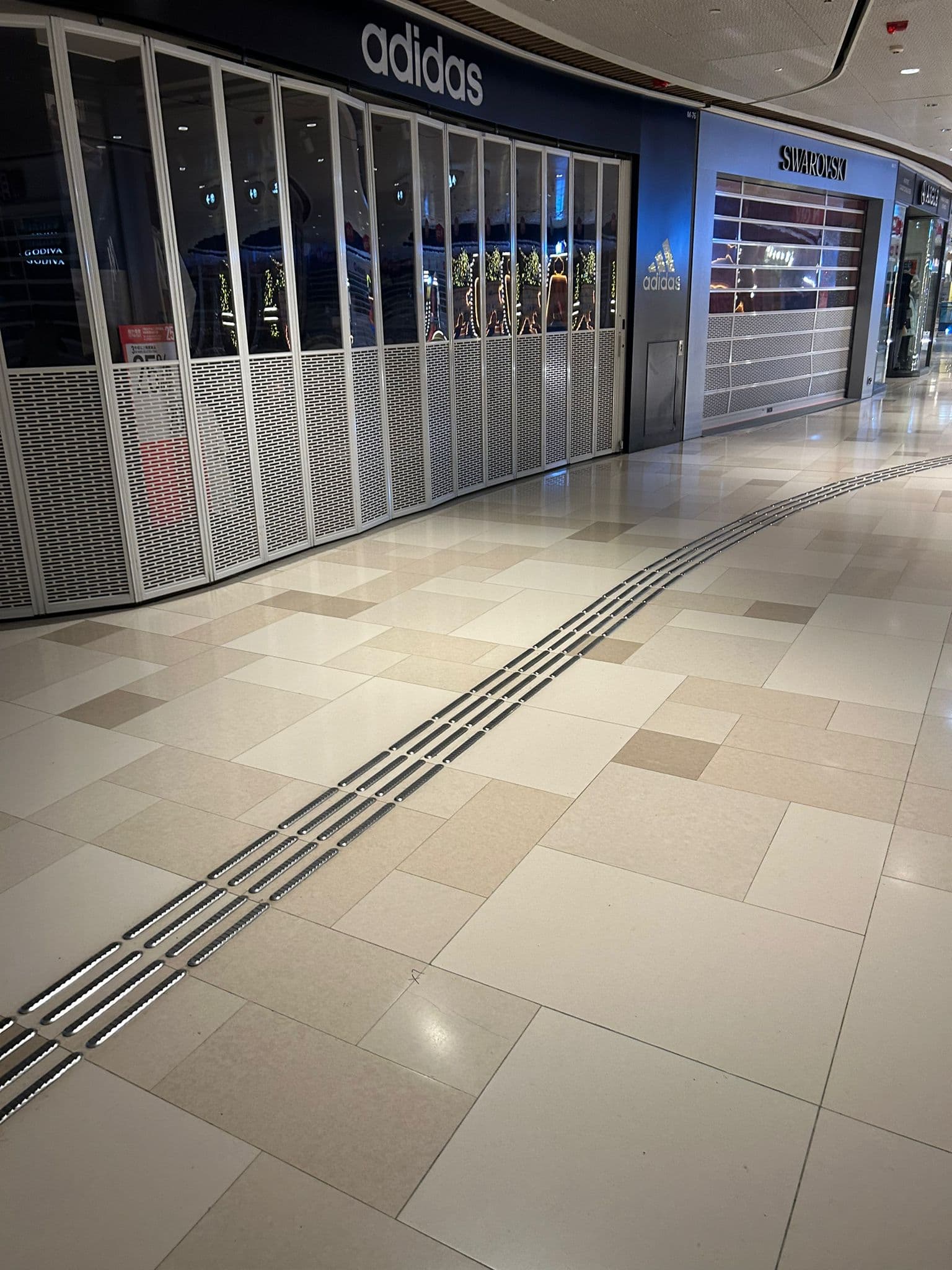 P1175 — V city-Improvement work for replace damaged floor tiles in Arcade area